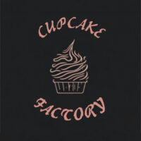 Cupcake rosa auf schwarzem Hintergrund